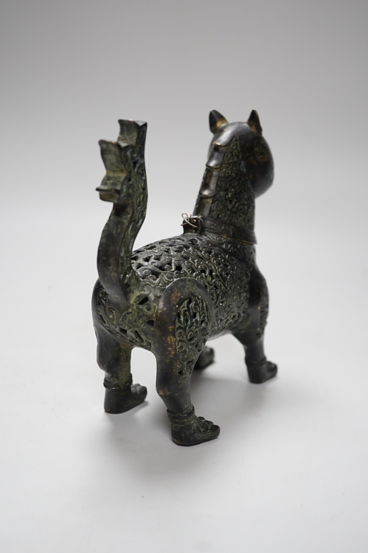 An early 20th century cast bronze Indonesian ‘lion dog’ incense burner. 18cm high